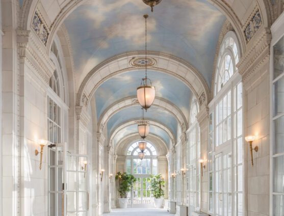 High arched ceilings with painted blue sky and white clouds with large floor to ceiling windows at our Nashville, TN hotel.