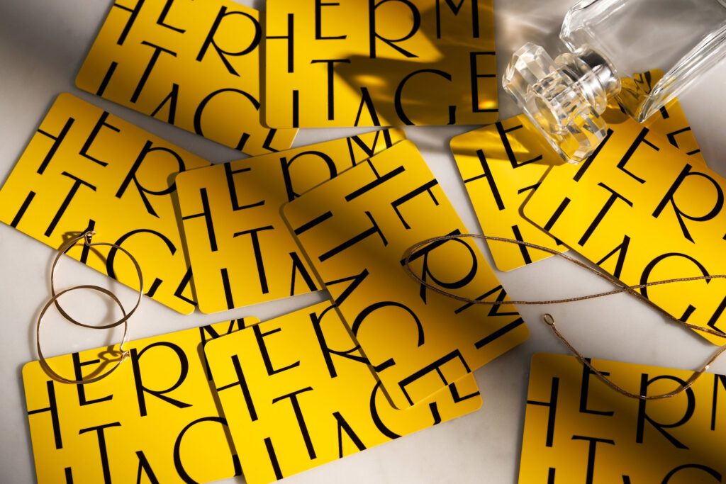 yellow gift cards that have Hermitage in branded font
